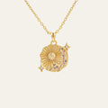 Gold undiscovered treasures necklace with a sun-shaped pendant on a plain background. it's a unique and custom design by mettle and bloom. 